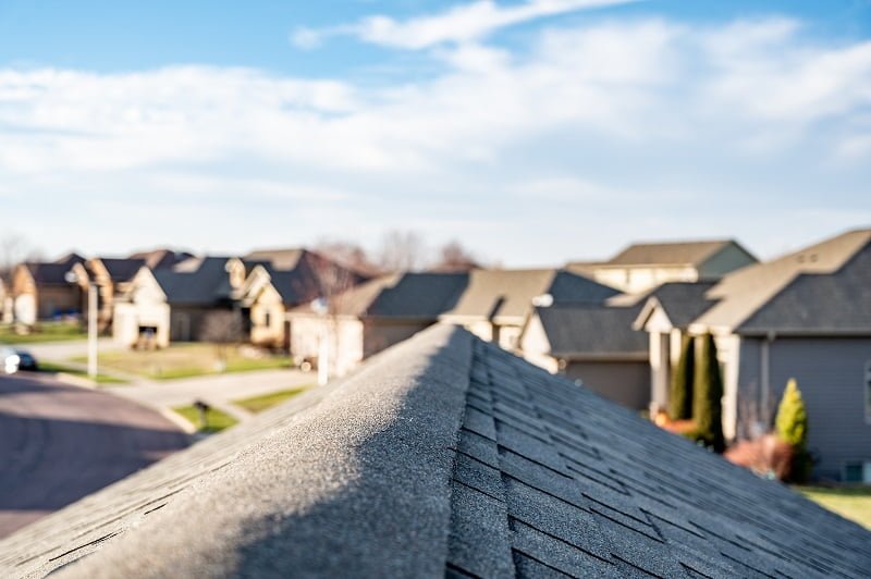 View down the top of an Asphalt shingle roof with ridge cap